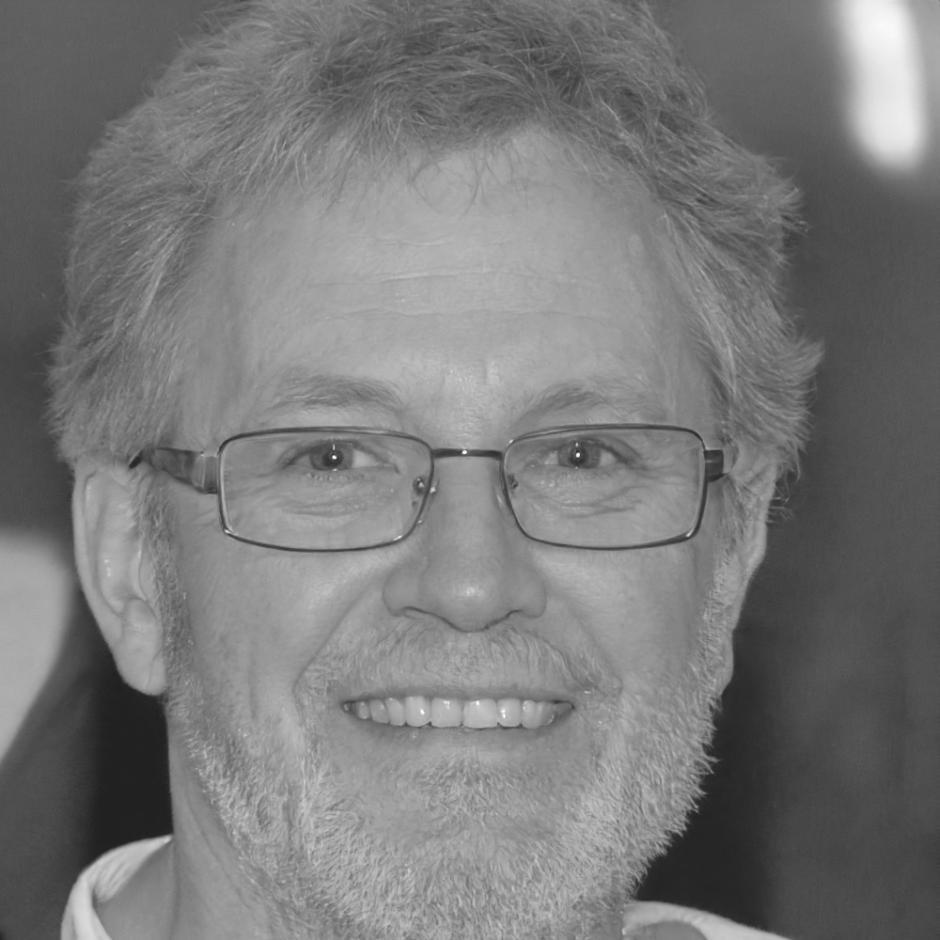 Professional headshot of financial expert